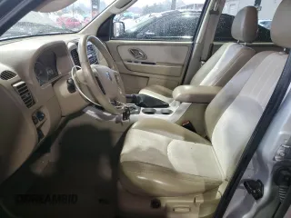 2005 Mercury Mariner Luxury z VIN 4M2YU561X5DJ04364, wystawiony jako Copart lot #44622345 z przebiegiem 265 744 mil mil oraz Szkody całkowita. Historia ofert i sprzedaży dostępna na DreamBid. Obrazek 7.