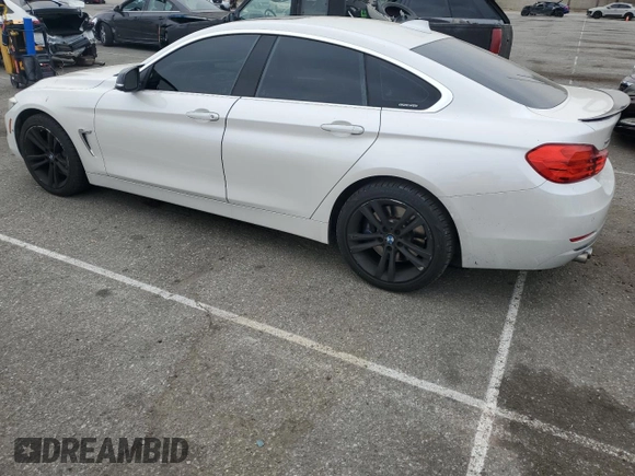 2015 BMW 4 Series 428i xDrive with VIN WBA4C9C59FD331372, listed as a Copart auction lot 58628665 with 81,245 mi miles and Salvage title. Bid and sale history available at DreamBid. Image 2.