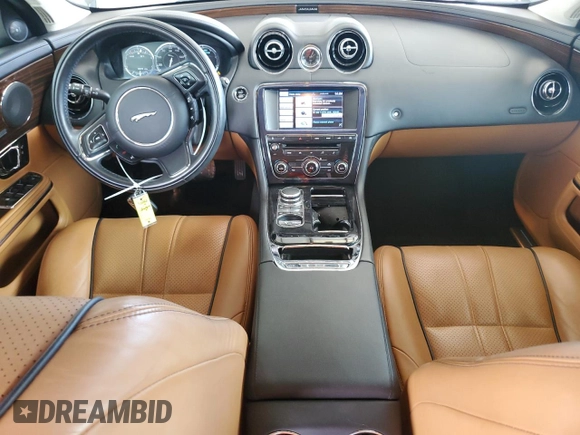 2014 Jaguar XJ Portfolio z VIN SAJWA2GZ4E8V60864, wystawiony jako Copart lot #76478674 z przebiegiem 50 578 mil mil oraz Szkoda całkowita • Salvage title. Historia ofert i sprzedaży dostępna na DreamBid. Obrazek 8.