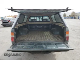 1993 Toyota Pickup z VIN 4TARN81AXPZ093111, wystawiony jako Copart lot #50526505 z przebiegiem 163 893 mil mil oraz Szkoda całkowita • Salvage title. Historia ofert i sprzedaży dostępna na DreamBid. Obrazek 10.