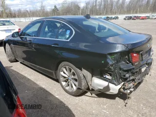 2014 BMW 5 Series 528i xDrive with VIN WBA5A7C59ED614738, listed as a Copart auction lot 53877125 with 151,190 mi miles and Salvage Title. Bid and sale history available at DreamBid. Image 2.