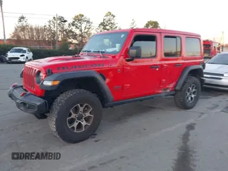 2022 Jeep Wrangler Unlimited Rubicon with VIN 1C4HJXFN4NW261809, listed as a IAAI auction lot 41459519 with 30,422 mi miles and . Bid and sale history available at DreamBid. Image 17.