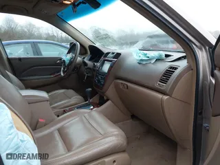 2003 Acura MDX Touring Pkg RES w/Navigation System with VIN 2HNYD18953H543466, listed as a IAAI auction lot 41542049 with 121,151 mi miles. Bid and sale history available at carsss.com. Image 5.