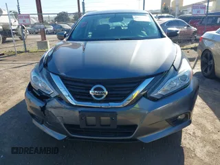 2016 Nissan Altima SV with VIN 1N4AL3AP7GC147035, listed as a IAAI auction lot 41419451 with 104,810 mi miles and . Bid and sale history available at DreamBid. Image 12.