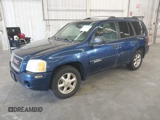 2003 GMC Envoy SLE with VIN 1GKDT13SX32365522, listed as a IAAI auction lot 42655399 with 210,765 mi miles and . Bid and sale history available at DreamBid. Image 2.