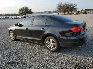 2015 Volkswagen Jetta S with VIN 3VW1K7AJ6FM201628, listed as a Copart auction lot 58118465 with 95,360 mi miles and Salvage title. Bid and sale history available at DreamBid. Image 2.