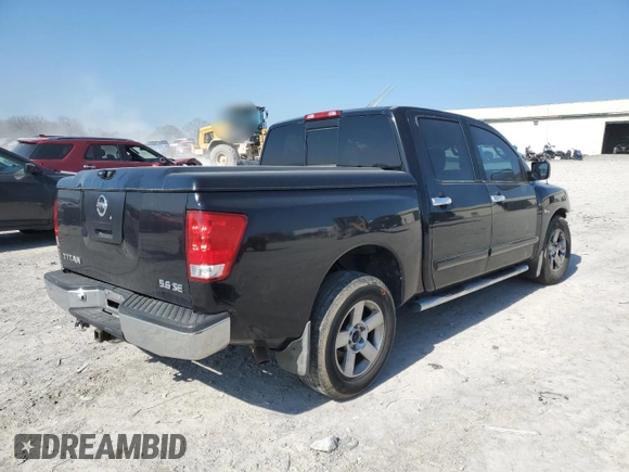 2004 Nissan Titan SE with VIN 1N6AA07A44N550324, listed as a Copart auction lot 48570595 with 206,330 mi miles and Salvage title. Bid and sale history available at DreamBid. Image 3.