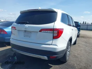 2020 Honda Pilot EX-L with VIN 5FNYF5H59LB027265, listed as a IAAI auction lot 41826300 with 57,201 mi miles. Bid and sale history available at carsss.com. Image 4.