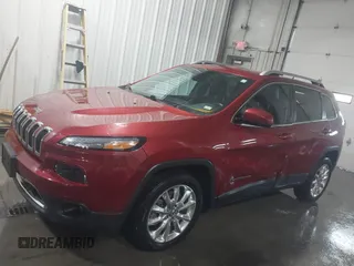 2015 Jeep Cherokee Limited with VIN 1C4PJLDS0FW585595, listed as a IAAI auction lot 41371621 with 102,108 mi miles and . Bid and sale history available at DreamBid. Image 14.