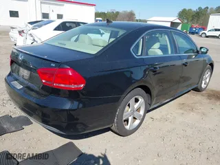 2013 Volkswagen Passat SE w/Sunroof with VIN 1VWBH7A36DC020984, listed as a IAAI auction lot 41883902 with 169,916 mi miles. Bid and sale history available at carsss.com. Image 4.