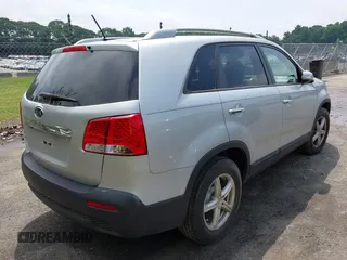 2013 Kia Sorento LX with VIN 5XYKT4A20DG360991, listed as a IAAI auction lot 42258999 with 129,278 mi miles and . Bid and sale history available at DreamBid. Image 4.