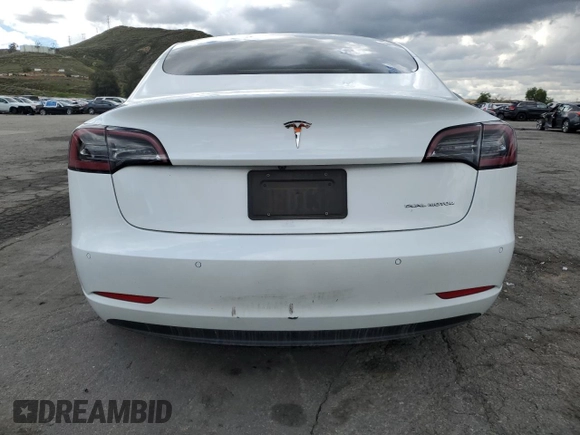 2022 Tesla Model 3 Long Range z VIN 5YJ3E1EB7NF365962, wystawiony jako Copart lot #48601865 z przebiegiem 121 541 mil mil oraz Szkoda całkowita • Salvage title. Historia ofert i sprzedaży dostępna na DreamBid. Obrazek 6.