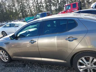 2013 Kia Optima EX with VIN 5XXGN4A75DG148233, listed as a IAAI auction lot 41878061 with 124,066 mi miles. Bid and sale history available at carsss.com. Image 14.