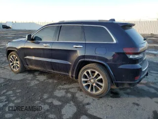 2017 Jeep Grand Cherokee Overland with VIN 1C4RJFCT0HC952052, listed as a Copart auction lot 85064124 with 184,206 mi miles and Salvage Title. Bid and sale history available at carsss.com. Image 2.