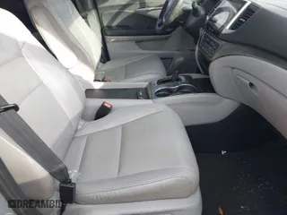 2018 Honda Pilot EX-L with VIN 5FNYF6H59JB026068, listed as a IAAI auction lot 41458049 with 128,769 mi miles. Bid and sale history available at carsss.com. Image 5.