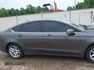 2016 Ford Fusion SE z VIN 3FA6P0H77GR367727, wystawiony jako IAAI lot #42274323 z przebiegiem 309 852 mil mil oraz . Historia ofert i sprzedaży dostępna na DreamBid. Obrazek 14.
