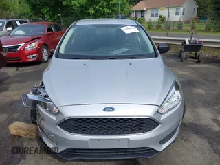 2017 Ford Focus S z VIN 1FADP3E21HL241557, wystawiony jako IAAI lot #42100036 z przebiegiem 106 764 mil mil oraz . Historia ofert i sprzedaży dostępna na DreamBid. Obrazek 12.