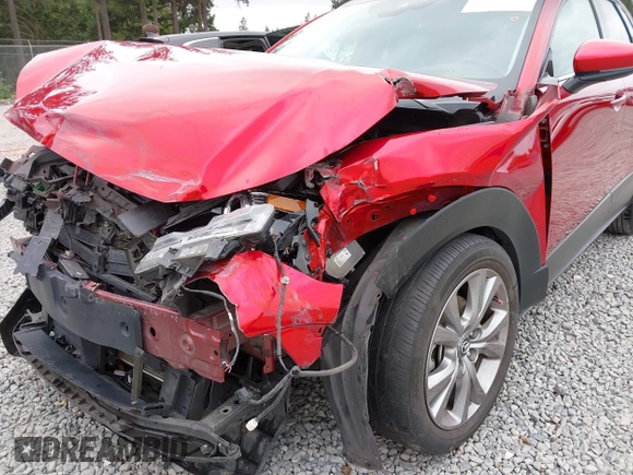 2021 Mazda CX-30 Premium with VIN 3MVDMBDM7MM213754, listed as a IAAI auction lot 42509691 with 61,230 mi miles and . Bid and sale history available at DreamBid. Image 6.