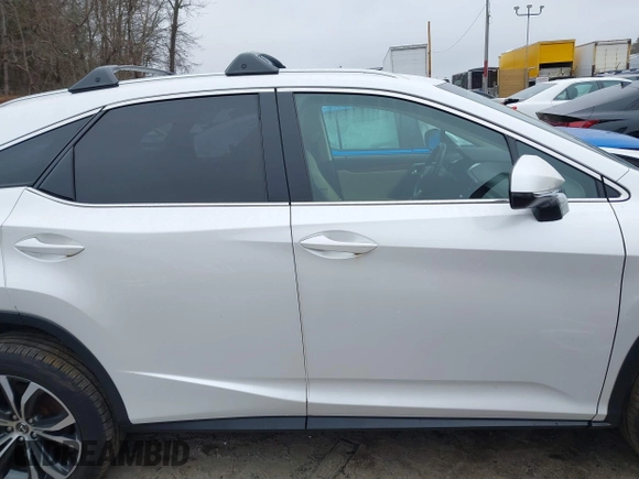 2018 Lexus RX 350 with VIN 2T2BZMCA7JC144576, listed as a IAAI auction lot 41811166 with 127,548 mi miles and . Bid and sale history available at DreamBid. Image 14.