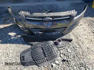 2016 Ford Escape SE z VIN 1FMCU9G96GUB76771, wystawiony jako Copart lot #59188375 z przebiegiem 167 300 mil mil oraz Szkoda całkowita • Salvage title. Historia ofert i sprzedaży dostępna na DreamBid. Obrazek 13.