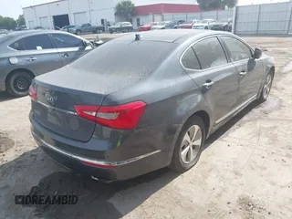 2015 Kia Cadenza Premium with VIN KNALN4D77F5177795, listed as a IAAI auction lot 42061727 with 112,063 mi miles. Bid and sale history available at carsss.com. Image 4.