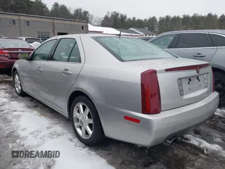 2005 Cadillac STS with VIN 1G6DW677250150773, listed as a IAAI auction lot 41675363 with 124,966 mi miles. Bid and sale history available at carsss.com. Image 3.