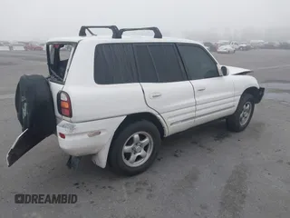 1999 Toyota RAV4 with VIN JT3GP10V0X7050334, listed as a IAAI auction lot 41607894 with 348,069 mi miles and . Bid and sale history available at DreamBid. Image 4.