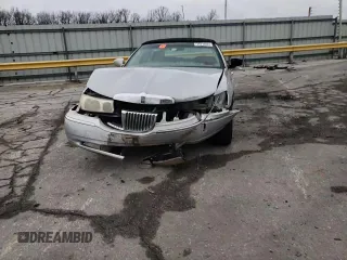 2001 Lincoln Town Car Cartier z VIN 1LNHM83W81Y629753, wystawiony jako Copart lot #36916024 z przebiegiem 150 875 mil mil oraz Szkoda całkowita • Salvage title. Historia ofert i sprzedaży dostępna na DreamBid. Obrazek 11.