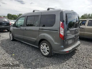 2017 Ford Transit Connect Wagon XLT with VIN NM0GS9F74H1301052, listed as a Copart auction lot 67001674 with 75,754 mi miles and Salvage Title. Bid and sale history available at carsss.com. Image 2.