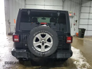 2020 Jeep Wrangler Sport S with VIN 1C4GJXAN0LW131400, listed as a Copart auction lot 44266995 with 73,576 mi miles and Salvage title. Bid and sale history available at DreamBid. Image 6.