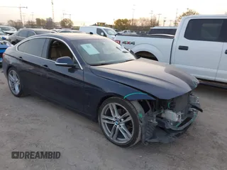 2018 BMW 4 Series 430i with VIN WBA4J1C5XJBG80412, listed as a IAAI auction lot 41788641 with 116,464 mi miles and . Bid and sale history available at carsss.com. Image 1.