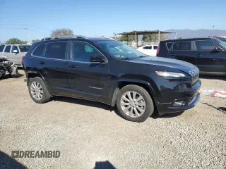 2018 Jeep Cherokee with VIN 1C4PJLJX9JD511600, listed as a Copart auction lot 46846615 with 67,482 mi miles and Salvage title. Bid and sale history available at DreamBid. Image 4.