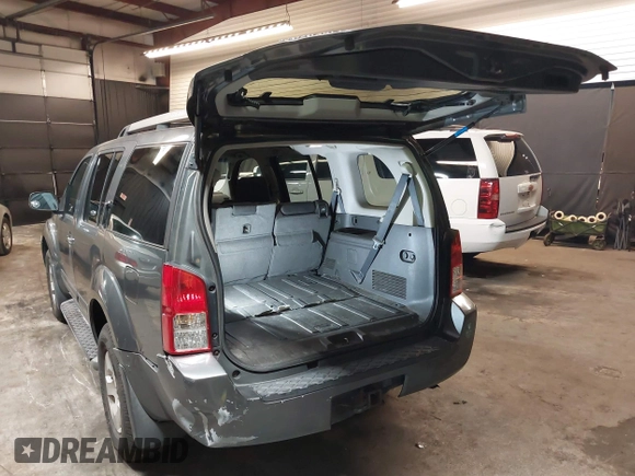 2005 Nissan Pathfinder SE with VIN 5N1AR18U95C730255, listed as a IAAI auction lot 41610769 with 154,252 mi miles. Bid and sale history available at carsss.com. Image 3.