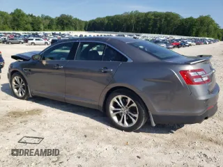 2013 Ford Taurus SHO with VIN 1FAHP2KT9DG139953, listed as a Copart auction lot 60977295 with 196,162 mi miles and Clean title. Bid and sale history available at DreamBid. Image 2.