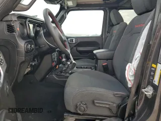 2024 Jeep Wrangler Rubicon z VIN 1C4PJXFG6RW261748, wystawiony jako Copart lot #51479585 z przebiegiem 7 911 mil mil oraz Szkoda całkowita • Salvage title. Historia ofert i sprzedaży dostępna na DreamBid. Obrazek 7.