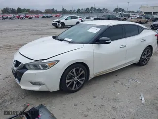 2016 Nissan Maxima 3.5 SL with VIN 1N4AA6AP2GC423595, listed as a IAAI auction lot 41490962 with 192,727 mi miles. Bid and sale history available at carsss.com. Image 2.