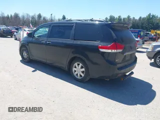 2011 Toyota Sienna XLE with VIN 5TDDK3DC8BS011975, listed as a IAAI auction lot 42112522 with 124,251 mi miles. Bid and sale history available at carsss.com. Image 3.