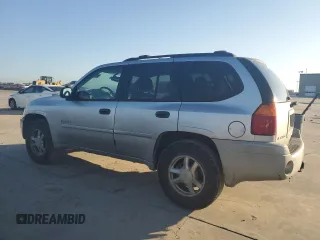 2006 GMC Envoy SLE with VIN 1GKDS13S962219216, listed as a Copart auction lot 71656164 with 328,966 mi miles and Salvage Title. Bid and sale history available at carsss.com. Image 2.