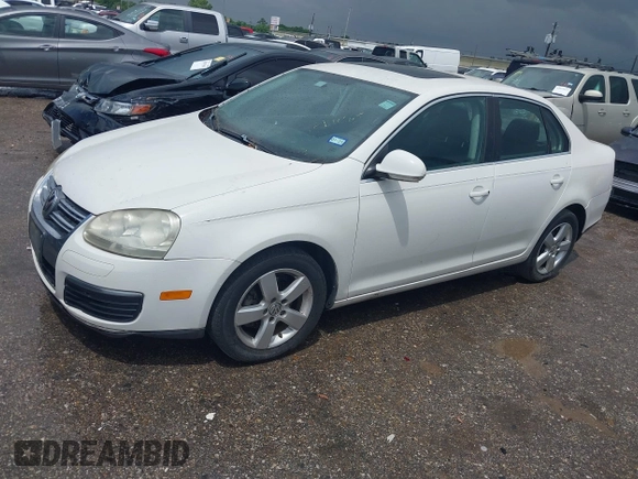 2009 Volkswagen Jetta Sedan SE with VIN 3VWRM71K19M076953, listed as a IAAI auction lot 42110365 with 182,208 mi miles. Bid and sale history available at carsss.com. Image 2.