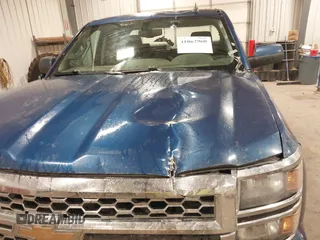 2015 Chevrolet Silverado 1500 LT with VIN 1GCVKREC9FZ424384, listed as a IAAI auction lot 41062960 with 211,461 mi miles and . Bid and sale history available at DreamBid. Image 6.