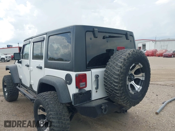2011 Jeep Wrangler Unlimited Rubicon with VIN 1J4BA6H10BL536027, listed as a IAAI auction lot 42567901 with 164,487 mi miles and . Bid and sale history available at DreamBid. Image 3.
