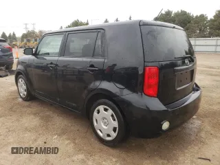 2009 Scion xB with VIN JTLKE50E491063990, listed as a Copart auction lot 53448265 with 152,420 mi miles and Salvage Title. Bid and sale history available at DreamBid. Image 2.