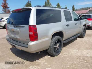 2010 Chevrolet Suburban LS with VIN 1GNUKHE34AR225345, listed as a IAAI auction lot 42106308 with 203,097 mi miles. Bid and sale history available at carsss.com. Image 4.