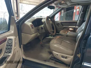 2000 Jeep Grand Cherokee Limited with VIN 1J4GW58N1YC264567, listed as a IAAI auction lot 42215459 with 170,874 mi miles and . Bid and sale history available at DreamBid. Image 5.