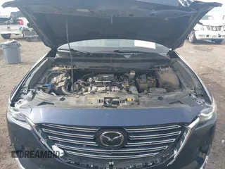 2020 Mazda CX-9 Grand Touring with VIN JM3TCBDY1L0402718, listed as a IAAI auction lot 42355511 with 87,205 mi miles and . Bid and sale history available at DreamBid. Image 10.