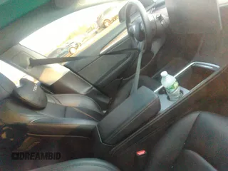 2023 Tesla Model 3 z VIN 5YJ3E1EA3PF449187, wystawiony jako IAAI lot #40320939 z przebiegiem Nie podano mil oraz . Historia ofert i sprzedaży dostępna na DreamBid. Obrazek 4.