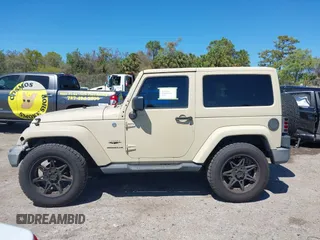 2011 Jeep Wrangler Sahara with VIN 1J4AA5D13BL562732, listed as a IAAI auction lot 41838520 with 148,359 mi miles and . Bid and sale history available at DreamBid. Image 15.
