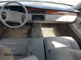 1995 Cadillac Concours z VIN 1G6KF52YXSU302434, wystawiony jako IAAI lot #42231281 z przebiegiem 153 236 mil mil oraz . Historia ofert i sprzedaży dostępna na DreamBid. Obrazek 16.