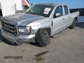 2017 GMC Sierra 1500 SLT z VIN 1GTV2NEC6HZ102412, wystawiony jako IAAI lot #41170633 z przebiegiem 163 321 mil mil oraz . Historia ofert i sprzedaży dostępna na DreamBid. Obrazek 2.