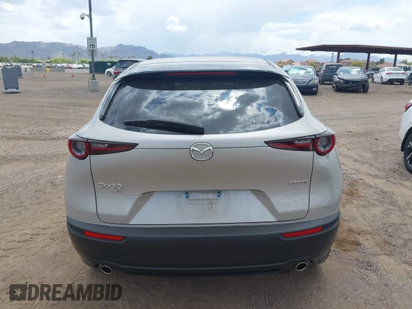 2024 Mazda CX-30 S Select Sport with VIN 3MVDMBBM3RM657918, listed as a IAAI auction lot 42218316 with 27,595 mi miles and . Bid and sale history available at carsss.com. Image 16.